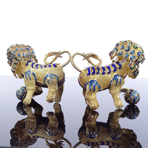 211 - A pair of Chinese silver-gilt and enamel Dogs of Fo, length 8cm