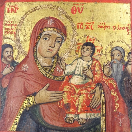 261 - A Greek painted and gilded icon on wood panel, 27cm x 19.5cm