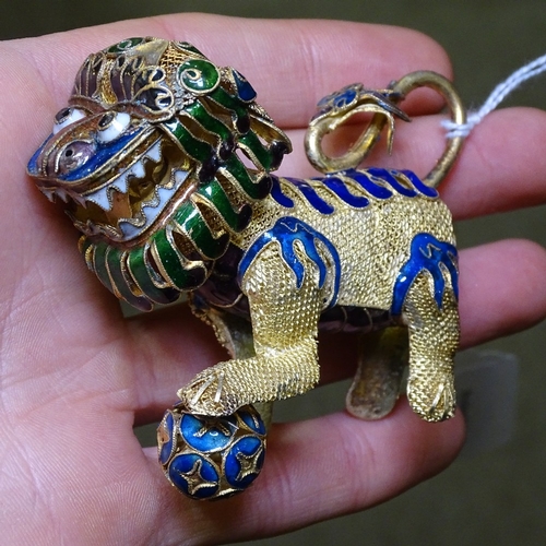 211 - A pair of Chinese silver-gilt and enamel Dogs of Fo, length 8cm