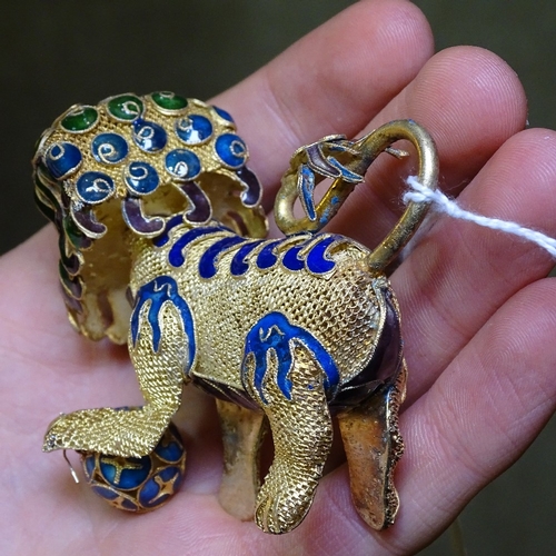 211 - A pair of Chinese silver-gilt and enamel Dogs of Fo, length 8cm