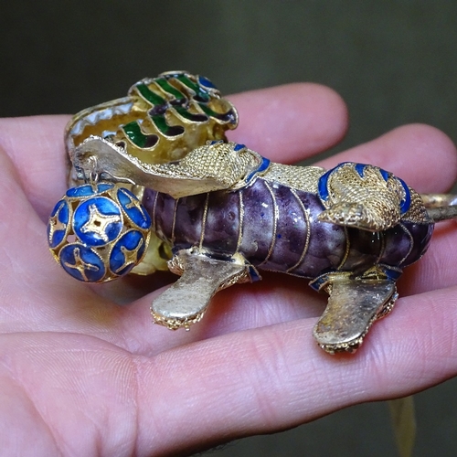 211 - A pair of Chinese silver-gilt and enamel Dogs of Fo, length 8cm