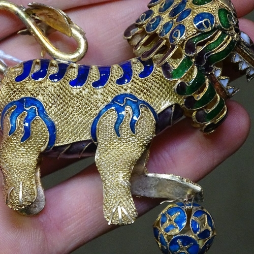 211 - A pair of Chinese silver-gilt and enamel Dogs of Fo, length 8cm