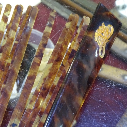 285 - A group of Antique fans, including mother-of-pearl and lace, a tortoiseshell fan frame, and fan tass... 