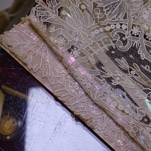 285 - A group of Antique fans, including mother-of-pearl and lace, a tortoiseshell fan frame, and fan tass... 