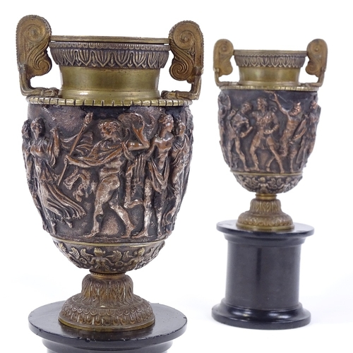 213 - A pair of 19th century relief moulded bronze Classical urns, by John Grinsell & Sons of Birmingham, ... 