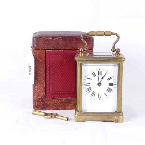 150 - A small brass-cased carriage clock, in original leather travelling case, with key, working order, he... 