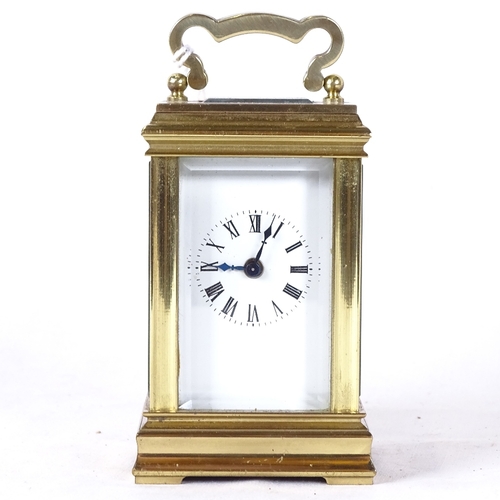 153 - A miniature brass-cased carriage clock, with key, height excluding handle 8.5cm, not currently worki... 