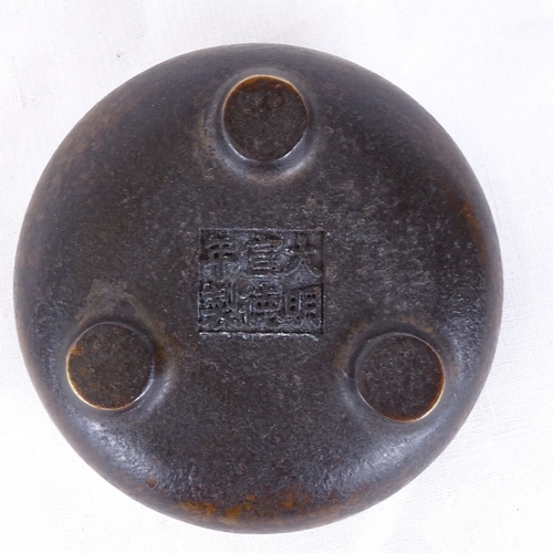 163 - A small Chinese bronze circular censer, 6 character mark underneath, diameter 9cm