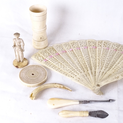 165 - Various ivory and bone items, circa 1900, including dice shaker, fan etc