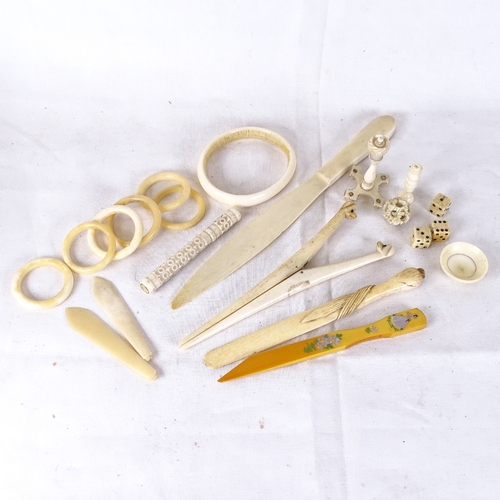 167 - Various ivory and carvings, including page turner, needle case, glove stretchers etc