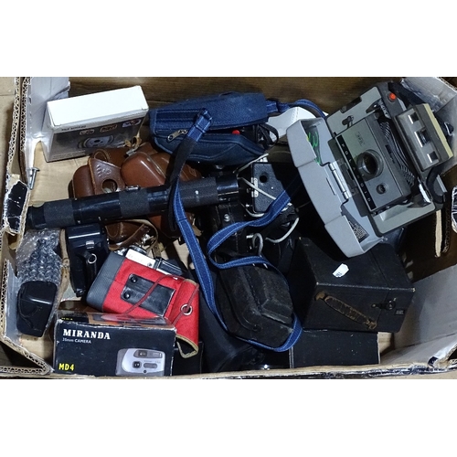 184 - A large quantity of various cameras, lenses, accessories etc