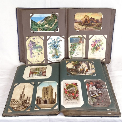 210 - 2 albums of various postcards, including topographical and cartoon