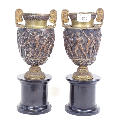 213 - A pair of 19th century relief moulded bronze Classical urns, by John Grinsell & Sons of Birmingham, ... 