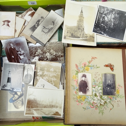 224 - A collection of Victorian original family photographs, and a large leather-bound album