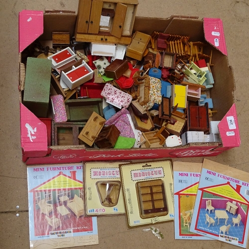 236 - A large quantity of doll's house furniture, including some kits