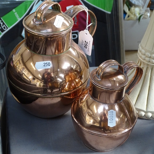 250 - 2 Jersey copper cream cans, largest height 21cm (2)