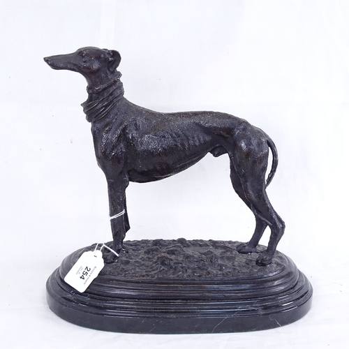 254 - After Mene, patinated bronze sculpture, standing Whippet, signed, on stepped polished marble plinth,... 