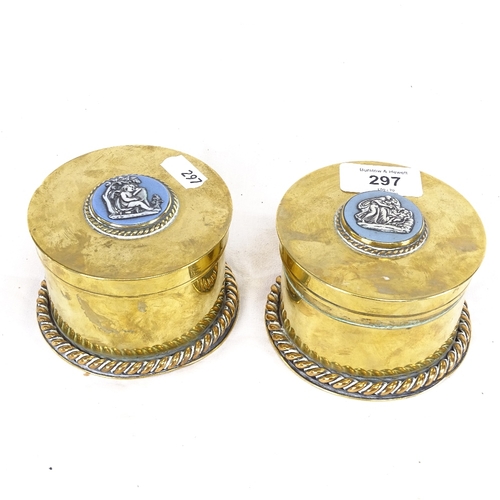 297 - A pair of cylindrical brass boxes with inset Wedgwood Jasperware style plaques, diameter 10cm