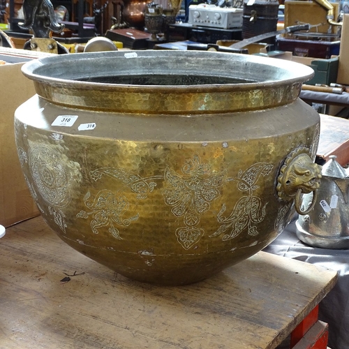 318 - A large Oriental 2-handled brass bowl, engraved floral decoration with kylin ring handles, diameter ... 