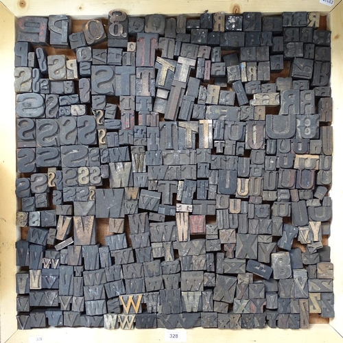 328 - A large quantity of printing letter blocks (2 trays)