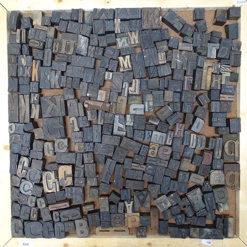 400 - A large quantity of carved wood printing letters and number blocks (2 trays)