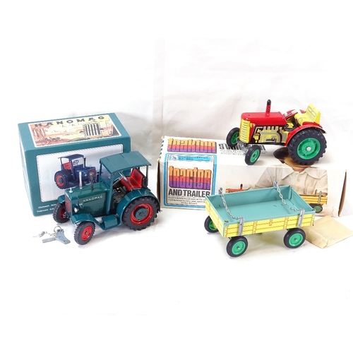 62 - A Hanomag R40 clockwork tinplate tractor, and an S Valnikem clockwork tinplate tractor and trailer, ... 