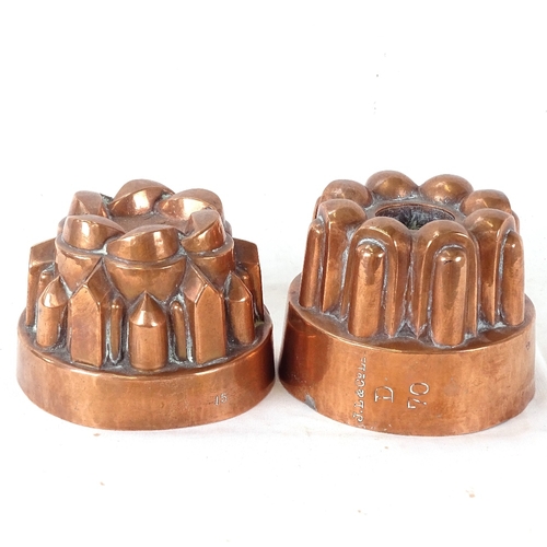 122 - 2 small copper jelly moulds, maker's marks JL & Co Ltd, largest height 8cm (2)