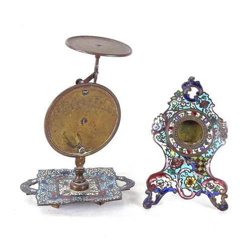 130 - A Russian brass and champleve enamel strut pocket watch holder, and a similar enamel set of scales, ... 