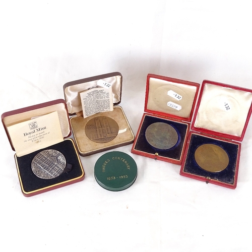 132 - Various Royal Mint boxed commemorative coins and medals, including Rhodes Centenary, Coronation meda... 