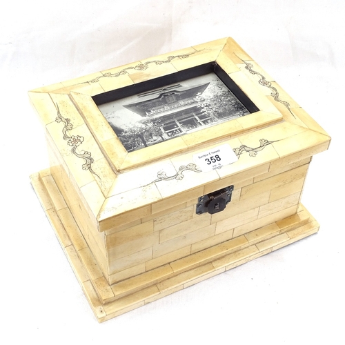 358 - A modern Chinese carved and engraved bone panel casket, with inset postcard panel lid, length 27cm