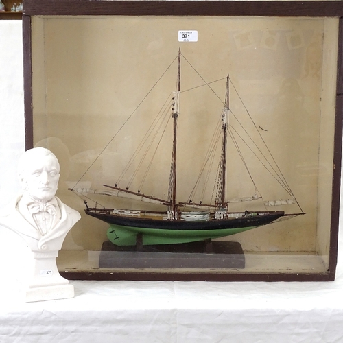 371 - A cased and glazed scratch-built model boat, case height 57cm, and a bust of Wagner