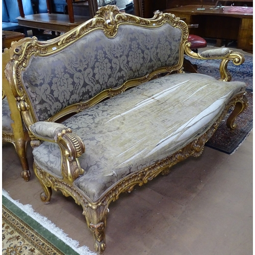 1405 - A pair of Antique Continental giltwood salon settees, with silk upholstery, on cabriole legs, L165cm