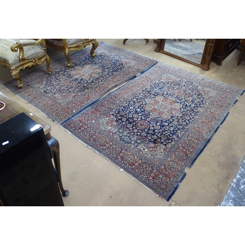 1409 - A pair of Persian blue ground rugs, 200cm x 134cm