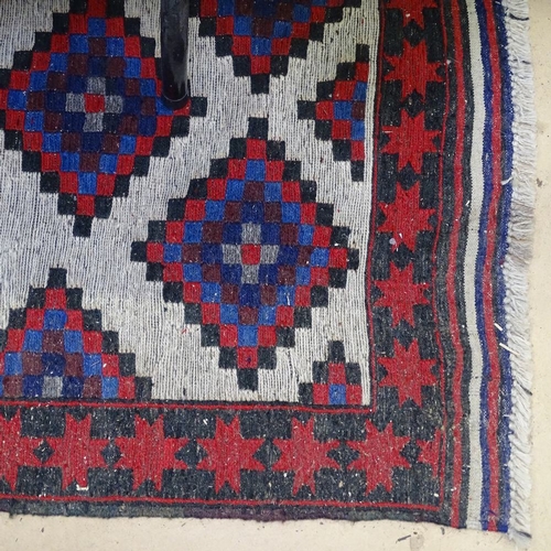 1414 - A Gul Berjasta red ground rug, 189cm x 114cm