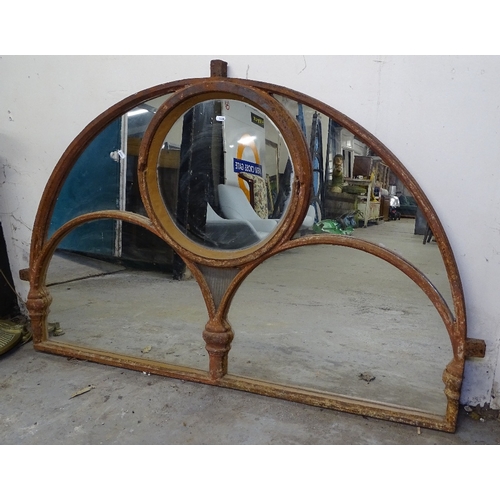 1430 - A Victorian arch-top cast-iron framed panelled mirror, originally from Brighton Aquarium, W145cm, H9... 