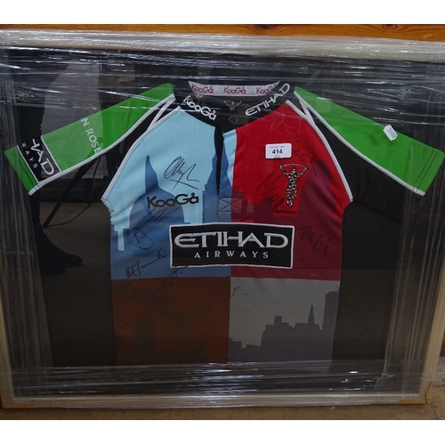 414 - A framed Harlequins signed rugby shirt