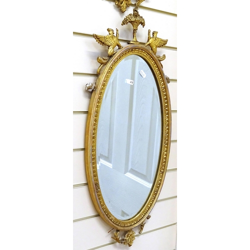 415 - A pair of gilt-gesso framed oval wall mirrors, overall height 72cm