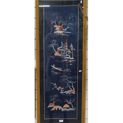 427 - An Oriental silk embroidered panel, depicting fishermen and village scene, overall height 128cm