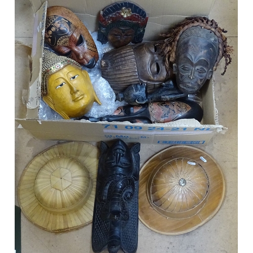 448 - 2 palm leaf safari hats, various carved and stained wood Tribal masks etc