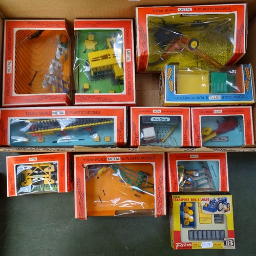 457 - Britain's boxed metal and plastic model farm items, including harvester, elevator etc