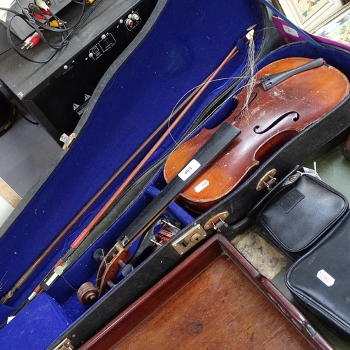 463 - An early 20th century violin, back length 35.5cm, with 2 bows and case