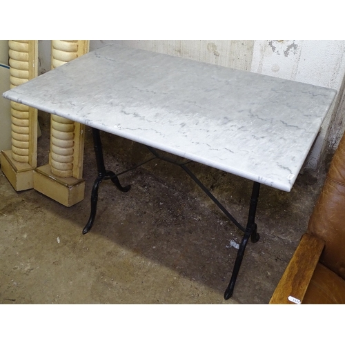 1478 - A rectangular marble-top garden table on cast-iron base, W100cm, H72cm, D62cm