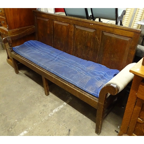 1496 - A Victorian panelled oak hall bench, L190cm