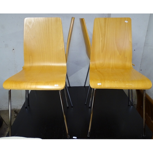 1519 - A set of bent-ply dining chairs on chrome legs