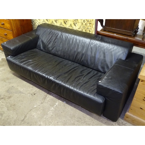 1524 - A Heal's black leather upholstered low 3-seater settee, L210cm