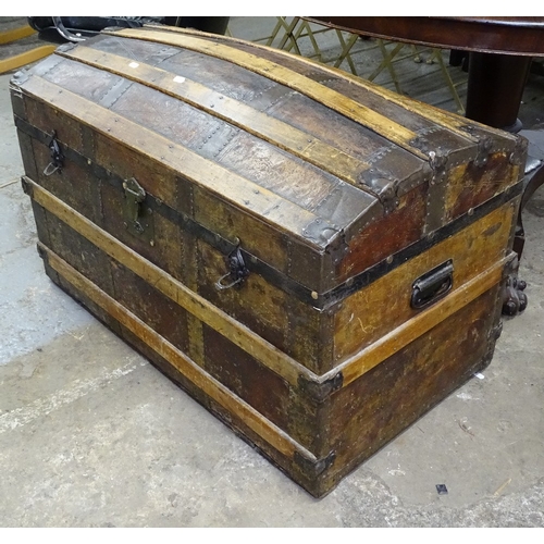 1531 - A 19th century steel and slat-bound dome-top trunk, W91cm