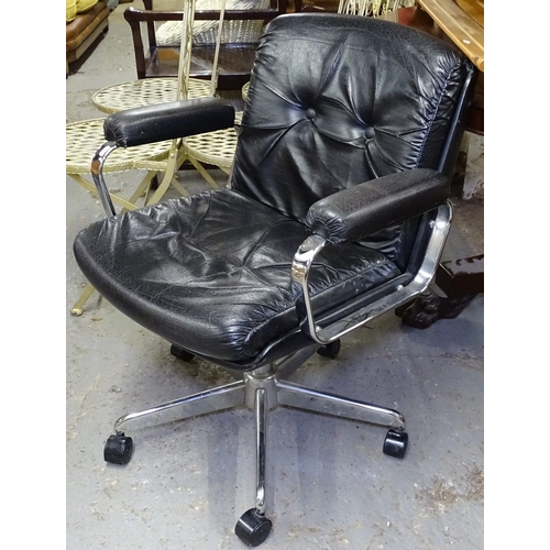 1533 - A modern chrome and upholstered swivel desk chair on star base