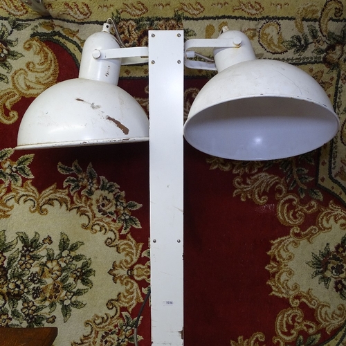 1536 - An industrial floor standing double light fitting