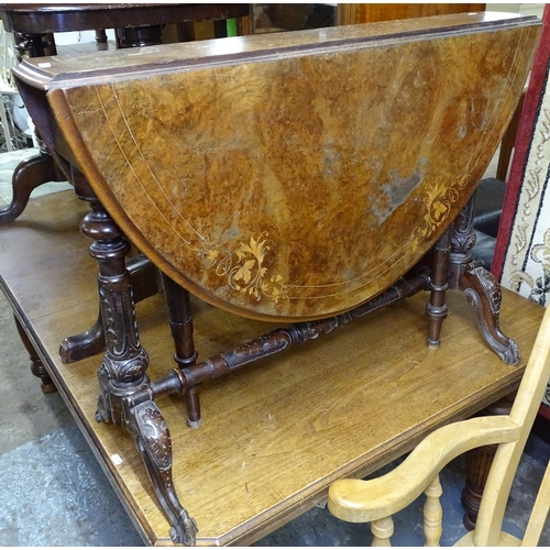 1540 - A Victorian burr-walnut Sutherland table, with floral inlaid marquetry decoration, on carved support... 