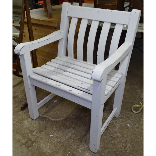 1546 - A white painted hardwood garden armchair